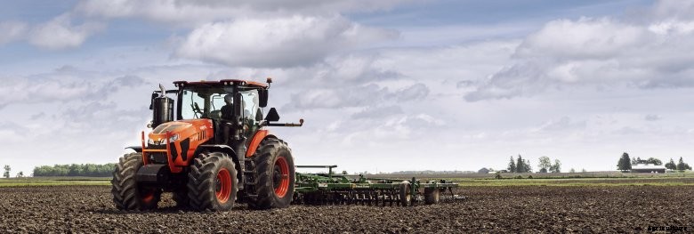 Kubota M8 tractor doing field work